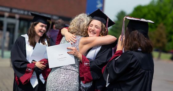 Jubilant female-dominated graduation celebration