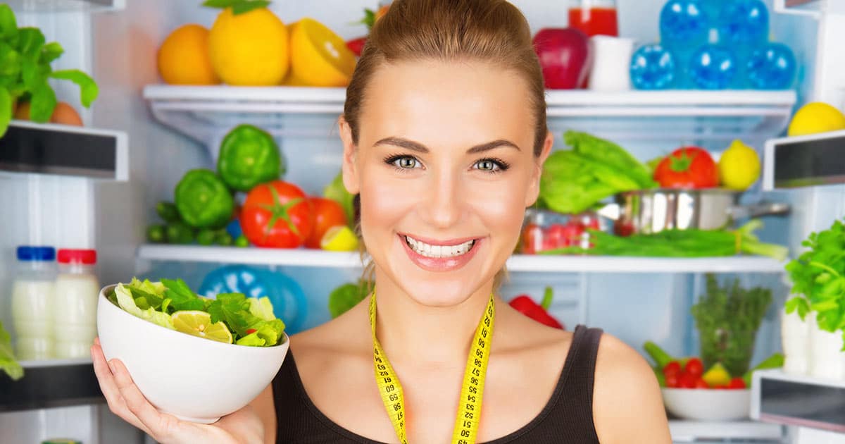 Nutritionist holding healthy food